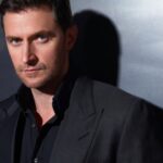 Richard Armitage mentions male partner, says he came out at 19